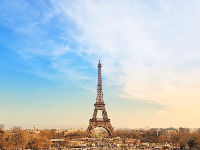 City view of Paris with the Eiffel Tower overseeing it. Discover things to do on your day trip to France.